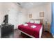 Bedroom with a double bed, nightstand, and window at 225 Cambria Ave, Davenport, FL 33897