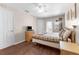 Bright bedroom featuring a queen bed, and plenty of natural light at 225 Cambria Ave, Davenport, FL 33897