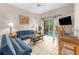 Living room with access to backyard patio at 225 Cambria Ave, Davenport, FL 33897