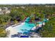 Resort-style pool with lounge chairs and palm trees at 1322 Oak Crest St, Davenport, FL 33837