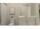 Simple bathroom with white vanity and shower at 3135 Zuni Rd, St Cloud, FL 34771