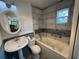 Updated bathroom with a soaking tub and new tile at 1401 Cr 449, Lake Panasoffkee, FL 33538