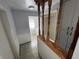 Small bathroom with shower and laundry area at 1401 Cr 449, Lake Panasoffkee, FL 33538