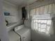 Laundry room with washer, dryer, and window at 1401 Cr 449, Lake Panasoffkee, FL 33538