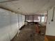 Large sunroom with windows and lots of natural light at 1401 Cr 449, Lake Panasoffkee, FL 33538