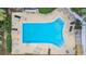 Aerial view of kidney shaped community pool at 150 El Dorado # 101, Winter Haven, FL 33884