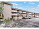 Two-story building with balconies and parking lot at 150 El Dorado # 101, Winter Haven, FL 33884