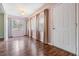 Charming dining area with hardwood floors and window lighting at 150 El Dorado # 101, Winter Haven, FL 33884