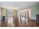 Spacious living room with laminate flooring and lots of natural light at 150 El Dorado # 101, Winter Haven, FL 33884