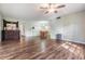 Bright living room with hardwood floors and ceiling fan at 150 El Dorado # 101, Winter Haven, FL 33884
