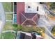 Aerial view showing home's roofline and surrounding landscape at 5 Loma Linda # 5, Lakeland, FL 33813