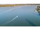 Boat cruising on calm lake waters at 5 Loma Linda # 5, Lakeland, FL 33813