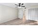 Light and airy bedroom with wood flooring and ceiling fan at 5 Loma Linda # 5, Lakeland, FL 33813