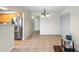 Open concept dining area adjacent to kitchen and hallway at 5 Loma Linda # 5, Lakeland, FL 33813