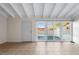Bright living room with tile floors and sliding glass doors leading to a patio at 5 Loma Linda # 5, Lakeland, FL 33813
