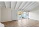 Bright living room with tile floors and vaulted ceiling at 5 Loma Linda # 5, Lakeland, FL 33813