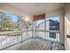 Screened porch with wooden flooring and views of the surrounding area at 5 Loma Linda # 5, Lakeland, FL 33813