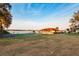 Community tennis courts with lake view at 5 Loma Linda # 5, Lakeland, FL 33813