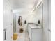Double vanity bathroom with granite countertops at 1125 Michelangelo Ln, Winter Haven, FL 33884