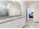 Bathroom with a double vanity and shower at 1125 Michelangelo Ln, Winter Haven, FL 33884