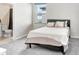 Small bedroom with full-size bed and access to bathroom at 1125 Michelangelo Ln, Winter Haven, FL 33884
