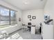 Home office with a desk and ample natural light at 1125 Michelangelo Ln, Winter Haven, FL 33884