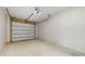 Empty garage with overhead door and ample space at 223 Stanley Ave, Frostproof, FL 33843