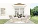Relaxing patio with comfortable seating and a view of the kitchen at 502 Puma Loop, Groveland, FL 34736
