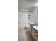 Clean bathroom with a tub and granite vanity at 713 Crest Pines Dr # 236, Orlando, FL 32828