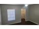 Bright bedroom with a large window and walk-in closet at 713 Crest Pines Dr # 236, Orlando, FL 32828