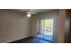 Bedroom with balcony access and a ceiling fan at 713 Crest Pines Dr # 236, Orlando, FL 32828