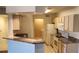 Modern kitchen with granite countertops and updated appliances at 713 Crest Pines Dr # 236, Orlando, FL 32828