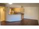 Open kitchen with granite countertops and modern appliances at 713 Crest Pines Dr # 236, Orlando, FL 32828