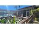 Private screened patio overlooking the community pool at 713 Crest Pines Dr # 236, Orlando, FL 32828