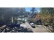 Community pool with relaxing patio area and pergola at 713 Crest Pines Dr # 236, Orlando, FL 32828