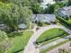 Aerial view of a house with a circular driveway at 1400 S Pennsylvania Ave, Winter Park, FL 32789