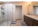 Elegant bathroom with double vanity, large shower, and modern fixtures at 1400 S Pennsylvania Ave, Winter Park, FL 32789