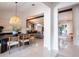 Open concept dining room with a view of the kitchen and living room at 1400 S Pennsylvania Ave, Winter Park, FL 32789