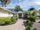 Inviting entryway with brick pavers and landscaping features at 1400 S Pennsylvania Ave, Winter Park, FL 32789