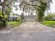 House exterior showcasing the garage and a neatly landscaped front yard at 1400 S Pennsylvania Ave, Winter Park, FL 32789