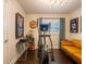 Home gym with an elliptical and sports memorabilia on the walls at 1400 S Pennsylvania Ave, Winter Park, FL 32789