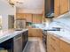 Modern kitchen with stainless steel appliances and marble countertops at 1400 S Pennsylvania Ave, Winter Park, FL 32789