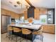 Modern kitchen with marble countertops and wooden cabinets at 1400 S Pennsylvania Ave, Winter Park, FL 32789