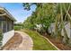 Brick pathway meandering through the backyard at 2227 Miguel St, Lakeland, FL 33801