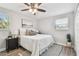 Cozy bedroom featuring a queen bed, nightstands, and ample closet space at 2227 Miguel St, Lakeland, FL 33801