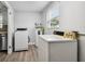Laundry room with washer, dryer and water heater at 2227 Miguel St, Lakeland, FL 33801