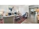 Open living space featuring a sofa and a view into the dining area at 2227 Miguel St, Lakeland, FL 33801