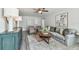 Living room with dark green cabinet and gray seating at 2227 Miguel St, Lakeland, FL 33801