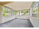 Bright screened porch with view of backyard at 2227 Miguel St, Lakeland, FL 33801