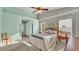 Bedroom with soft, neutral colors and plush carpeting, with a king size bed at 4064 River Crest Cir, Leesburg, FL 34748